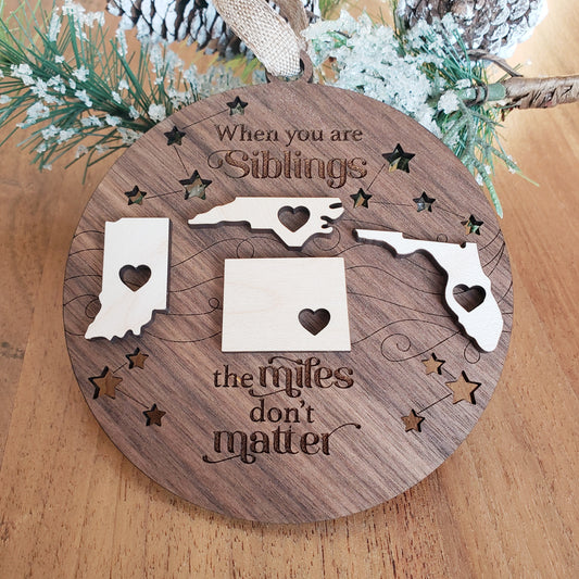 When you are Siblings the miles don't matter Christmas Ornament